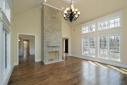 Living room with two story fireplace